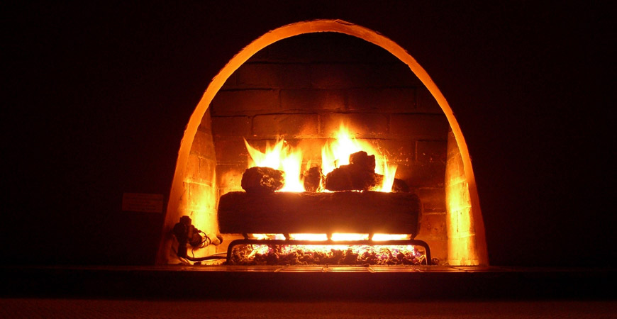 log fire in fireplace