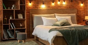 Add an area rug and string lights to make your basement more homey.