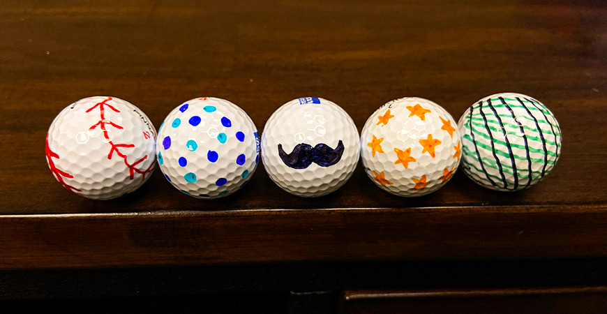 Brighten Dad's day with a set of colorful golfballs for Father's Day