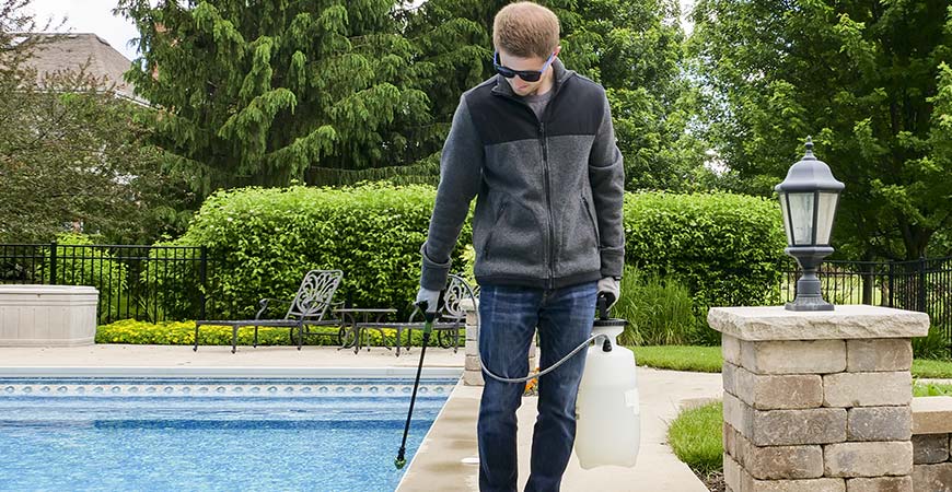 Cleaning pool deck with Wet & Forget for Mother's Day