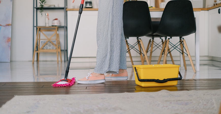 Clean your hardwood floors with a sponge mop.