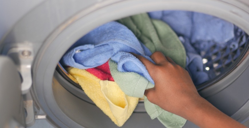 A clean dryer with clean towels.