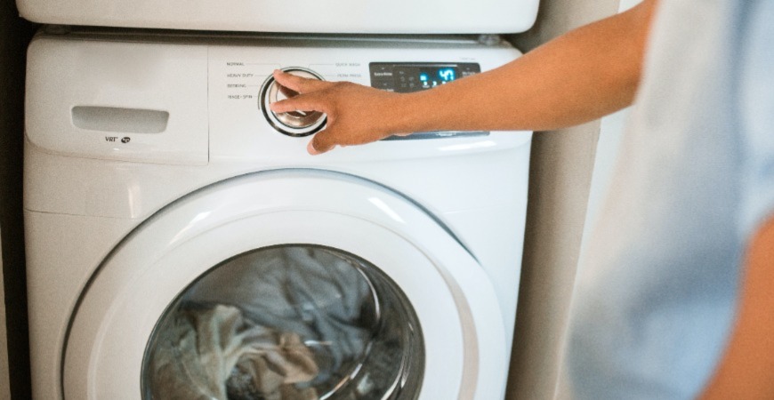 A person using a clean washer