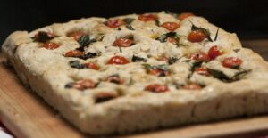 Freshly baked focaccia with spring herbs.