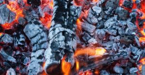 Burning wood is essential for a Labor Day barbecue.