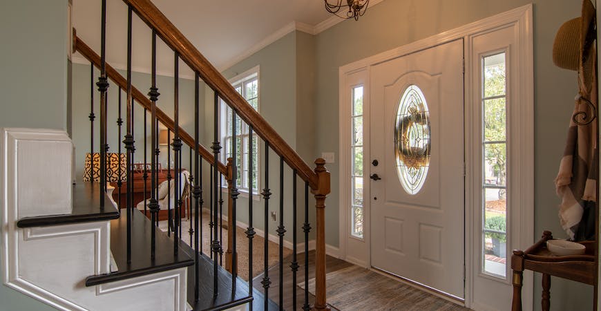 An organized entryway welcomes guests.