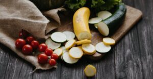 Tomatoes and zucchinis are common ingredients in fall garden harvest recipes.